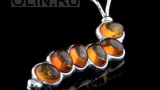 Брошка серебряная с янтарем