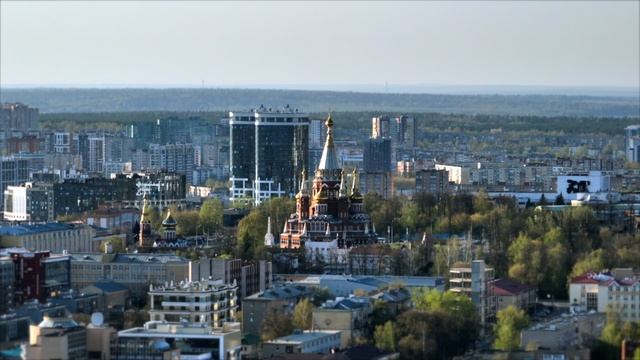 город