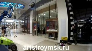 Монтаж роботом Winlet 575 джамбо стекол в ТЦ Мега