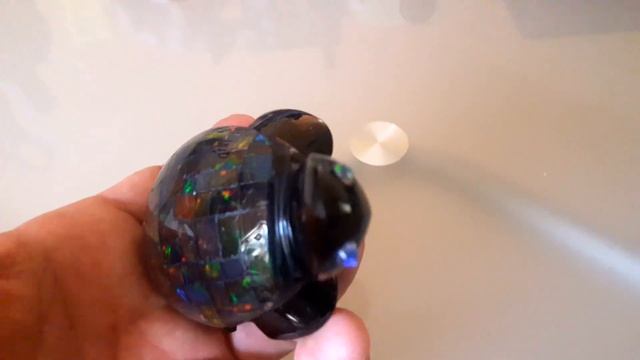 mexican opal mosaic on obsidian turtle