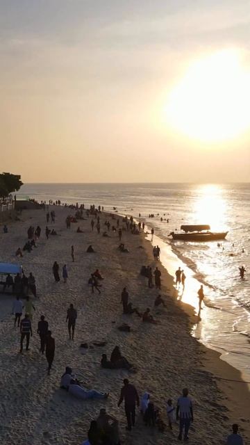 Island "Serenade Of Sunset: Evening Stone Town Beach, Zanzibar"