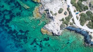 🌊 From Sky to Sea: Journey through the Pristine Coral Bay in Cyprus with Incredible Drone Views