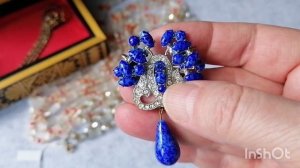 163. Украшения с кристаллами и сатиновые бусы.