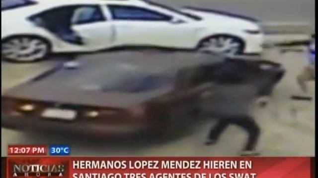 Hermanos López Méndez hieren en Santiago tres agentes Swat смотреть онлайн
