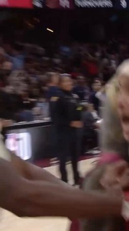 Fan makes a half-court shot in Cleveland