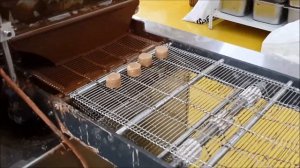 Kudvik Chocolate Atelier production of chocolates with nut filling
