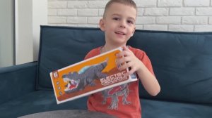 Распаковка игрушки. Крутой танцующий крокодил.Танцует и светится в темноте.