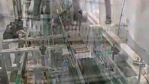 Автоматическая линия упаковки шоколадных батончиков в демонстрационную коробку.