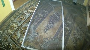 Замена в рамке противомоскитной сетки.