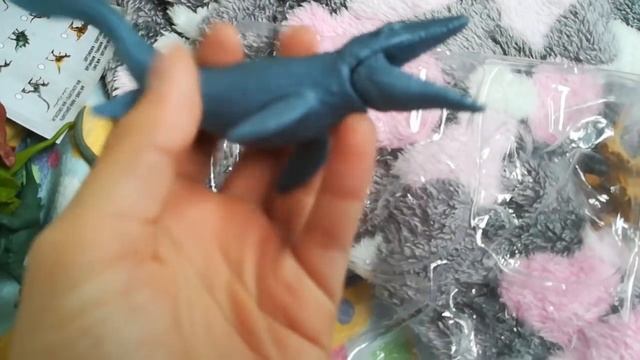 Обзор на большую упаковку где находятся 15 маленьких динозавров из мира юрского периода 2 смотреть онлайн