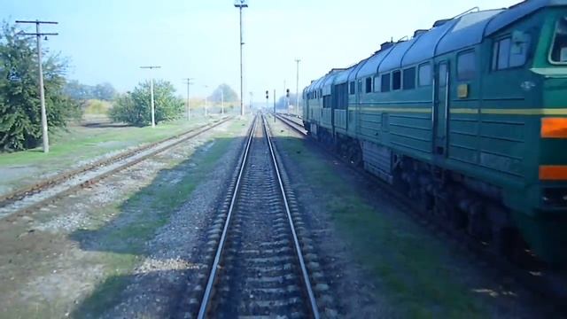 2ТЭ116-1319 с полувагонами на ст.Каховское море смотреть онлайн