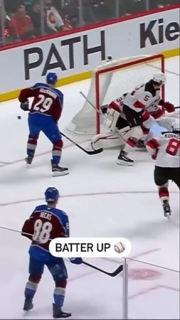 MacKinnon Bats It Out Of The Air