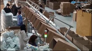 Упаковка стульев в коробки на автоматизированной конвейерной линии ООО "Норматив"