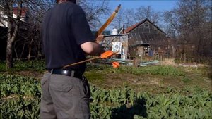 Стрельба из традиционного лука с кольцом