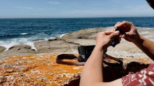 Loading Kodak Ektar 100 into Leica M3 by the ocean