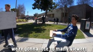 riding a school desk at cal poly pomona