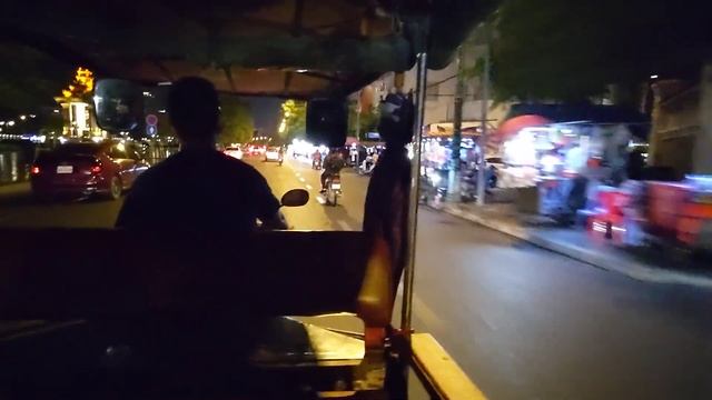 Past Naga in a tuk tuk from Morgan Tower/Diamond Island back to Street 178