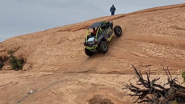 Behind the Rocks Moab Utah in the Rain 😅 with stock Honda Pioneer, long travel Pioneer and KRXes смотреть онлайн