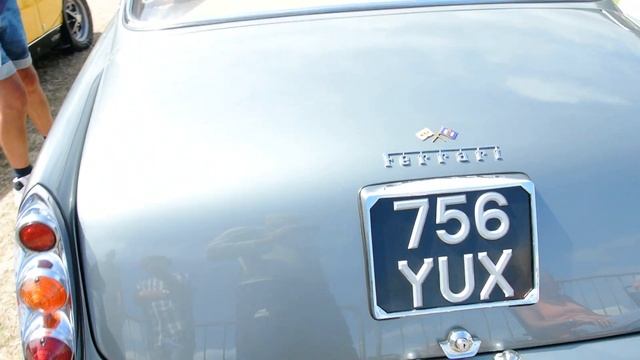 A Ferrari 250 GTE parked on display смотреть онлайн