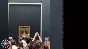 Man in wig throws cake at Mona Lisa in Louvre Museum