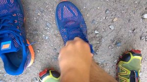 He is sockless in his Salomon Speedcross and Nike Lunarglides