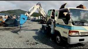 Автоэкскаватор Isuzu Elf с гидромолотом