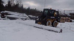 Мини погрузчик John Deere 318D с вилами