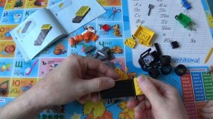 Unboxing and assembling a Lego City (60284) Roadwork Truck constructor with a daughter part 1
