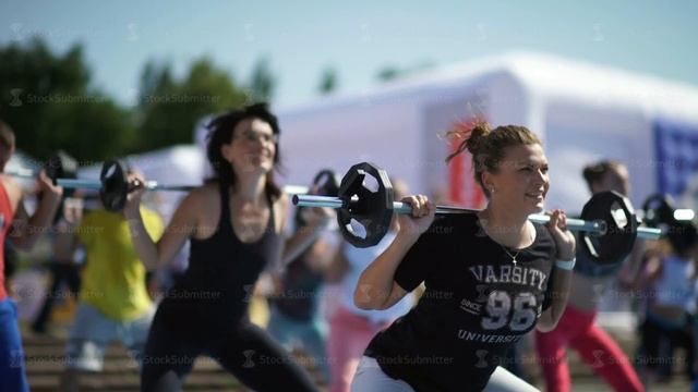 Russia, Novosibirsk, 2016: Women raise the bar. barbell exercises смотреть онлайн