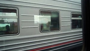 Вид из окна поезда. Скрещение с пассажирским поездом Екатеринбург - Устье-Аха на станции Сарагулка