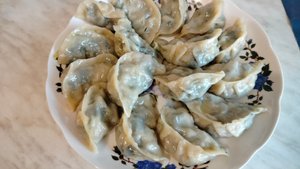 Манты с шпинатом и картофелем.