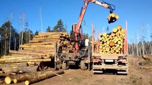 Погрузка леса гидроманипулятором Jonsered