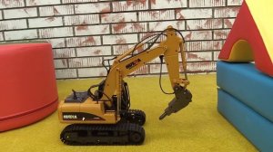 Распаковка - Машина с отбойным молотком на радиоуправлении. Детские игрушки.