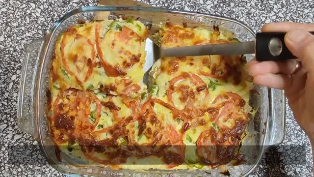 Минтай, запечённый с овощами в духовке