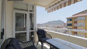 Видовая квартира в Алании рядом с пляжем Клеопатра. Недвижимость под ВНЖ Турции.