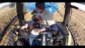Cat Challenger MT765C track tractor on Kinze 1050 track grain cart during corn harvest fall 2013