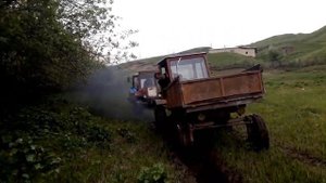 Трактор #MTЗ 1221 и #T25 застрял в грязи.#Т16 пришел на помошь.