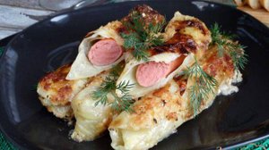 Сосиски в капустных листьях