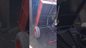 самодельный мини погрузчик с самосвальным прицепом.