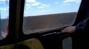 Боронование поля на тракторе Т4 часть 2