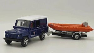CORGI Land Rover Defender с лодкой