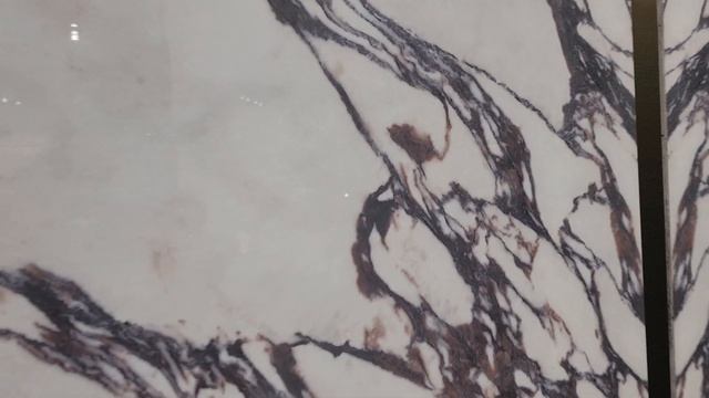 Керамический камень Calacatta Viola INFINITY