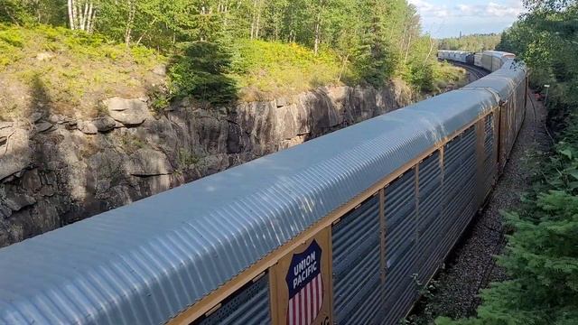 Grey ghost! westbound CPKC manifest 421 roars into the rock cut west of Ingolf on Aug 3rd, 2024.