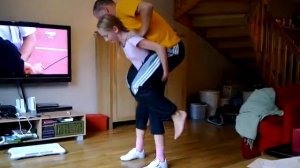 Strong 11 years old girl lift carry Dad