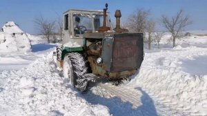 Как Т150К толкает снег?