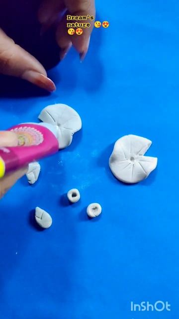 lotus earrings with mouldit clay 😍😍😍😘😘😘 #earrings  #youtubeshorts  #handmadejewelry #moulditclay смотреть онлайн