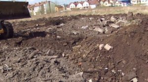 Отсыпка участка под застройку погрузчиком JCB 4CX - steh39.ru