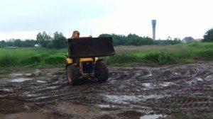Отсыпка перепада высот на участке экскаватором JCB 3CX - steh39.ru