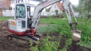 Миниэкскаватор Takeuchi TB 125 обратная засыпка траншеи газопровода и планировка. Калининград