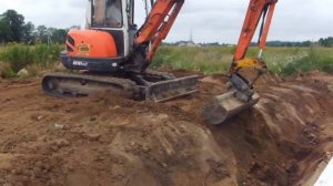 Мини-экскаватор Kubota против валуна - кто кого?! - steh39.ru